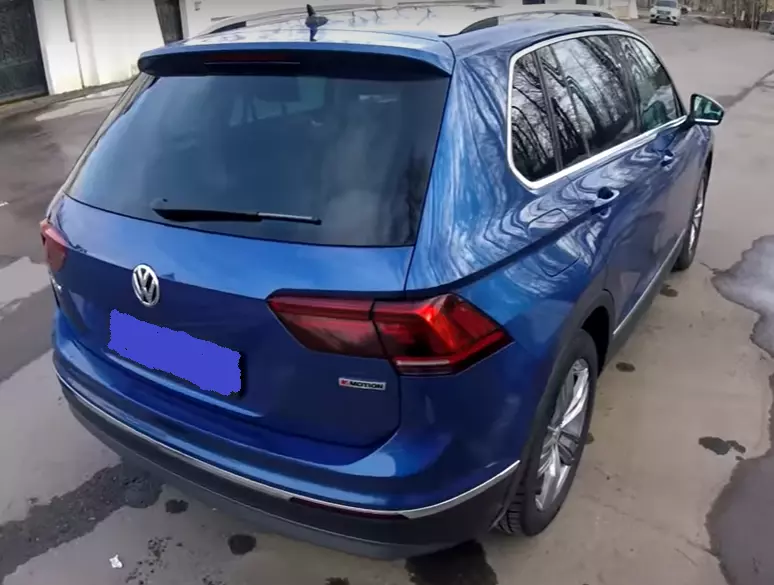 
                                                    Volkswagen Tiguan  